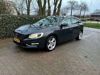 Vaurioauto  passenger cars Volvo V-60 2.4 D6 AWD Plug-In Hybrid Summum 2014/3