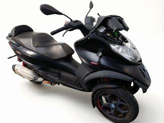 krockskadad bil bromfiets Piaggio  MP3 2018/1