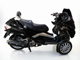 krockskadad bil bromfiets Piaggio  MP3 2010/6