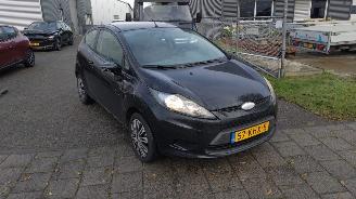 skadebil auto Ford Fiesta 1.25 limited  benzine airco 2009/1