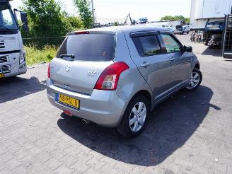 Salvage car Suzuki Swift 1.3 2009/7