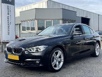 Schadeauto BMW 3-serie 320i High Executive AUTOMAAT 2017/9