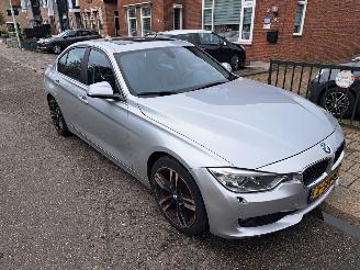 Damaged car BMW 3-serie 320i high exec.automaat 2013/1