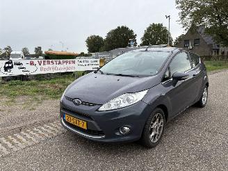 skadebil auto Ford Fiesta 1.25 Titanium airco 2012/1