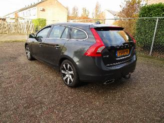 Volvo V-60 2.4 D6 AWD Hybride Schadevrij picture 2
