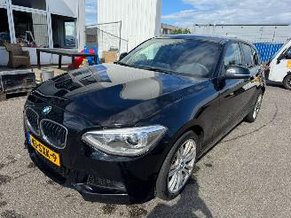 skadebil auto BMW 1-serie 116i Business 2012/1
