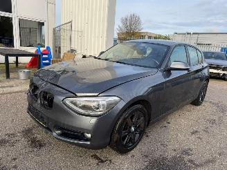 Schadeauto BMW 1-serie 116i Business AUTOMAAT 2011/11
