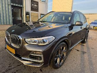 Damaged car BMW X5 xDrive45e AUTOMAAT Executive BJ 2021 122.333 KM 2021/11