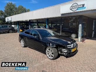 skadebil auto Mercedes C-klasse 180 Coupe Facelift Navi H&K Clima Stoelverw. 2011/7