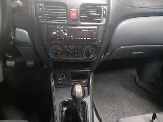 Nissan Almera Almera (N16) Hatchback 1.5 16V (QG15DE(Euro 4)) [72kW]  (10-2002/09-20=
06) picture 17