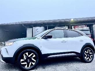 Auto incidentate Opel Mokka-E 50-kWh 11kW bl. Business Elegance aut 136pk - nap - stuurverwarming - navi - camera - line + side assist - keyless - virtual - 2x laadkabels - org NL 2021/8