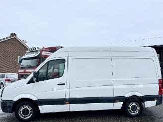 krockskadad bil bedrijf Volkswagen Crafter 30 2.0 TDI 109pk 6-bak L2/H2 Bleum. euro5 - nap - navi - 3 pers - clima - cruise - distr+wp vernieuwd 173dkm 2014/6