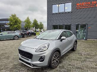Vaurioauto  passenger cars Ford Puma 92kw HYBR / TITANIUM 2022/2
