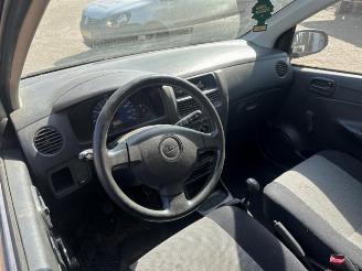 Daihatsu Cuore Cuore (L251/271/276), Hatchback, 2003 1.0 12V DVVT picture 4