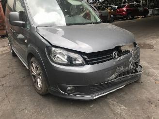 Damaged car Volkswagen Caddy Combi 1600CC - 75KW - DIESEL - 2013/8